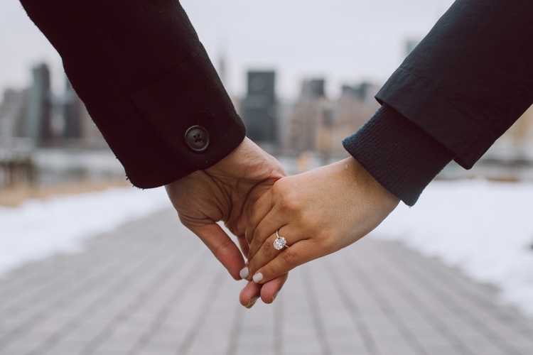 Gantry Plaza State Park LIC, Jay proposed to his girlfriend Aditi the day before valentines day on February 13, 2021 and coldest day! Aditi and Jay met during school while they were studying for MBA at NYU. Proposal totally caught Aditi by surprise, Jay fell on one knee on the edge of Gantry Plaza State Park LIC pulled out the most beautiful diamond ring. With excitement and over joyed hearts, as fiancés we waked around Gantry Plaza State Park to Queens Public Library for quick portraits of the lovers before sending them away for their engagement celebration. Aditi and Jay's Gantry Plaza State Park LIC proposal photograph captured by Hey Karis documenting elopements and weddings in NY NJ and planet earth.